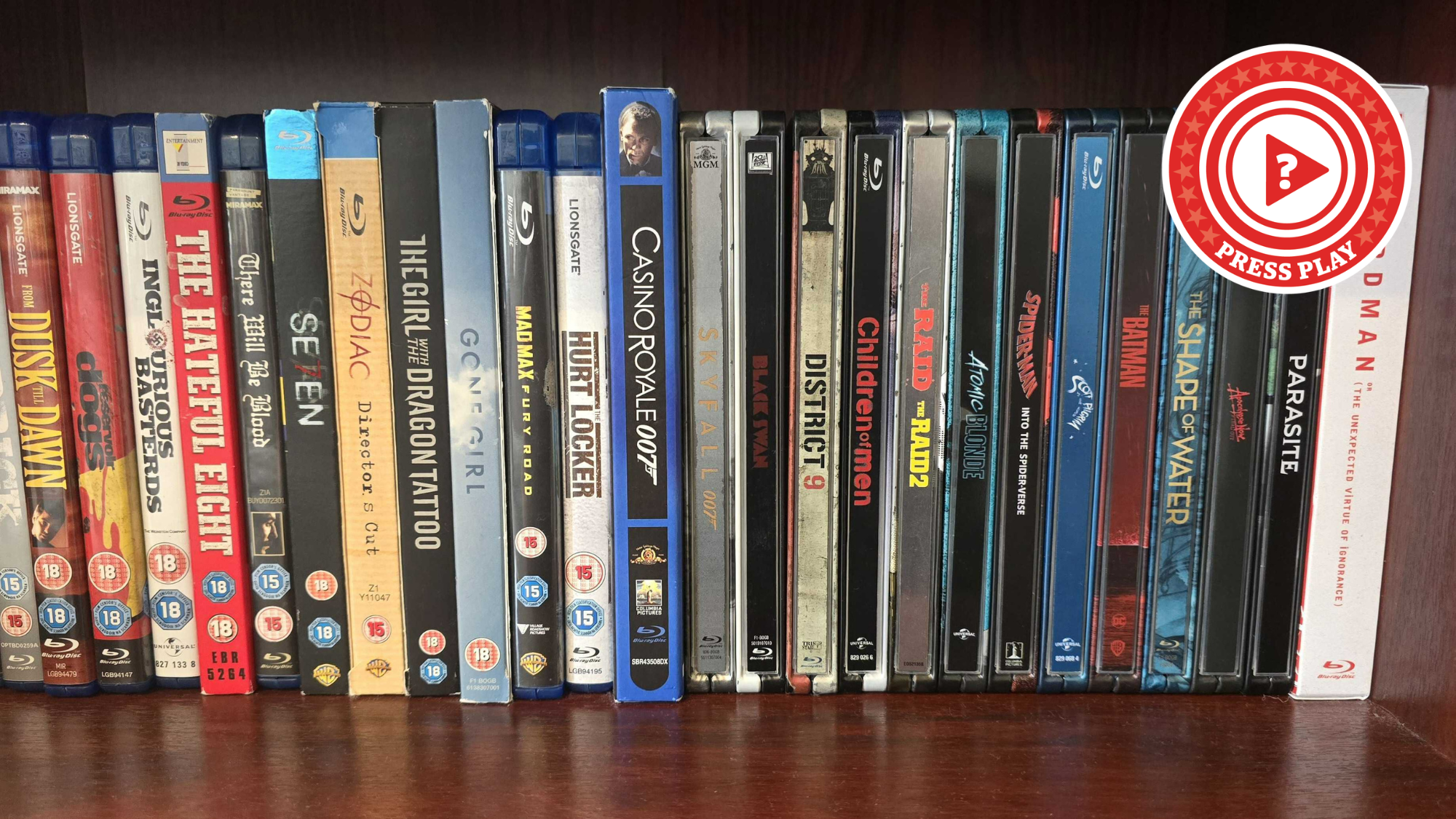A selection of Blu-rays on a shelf with the press play logo overlaid