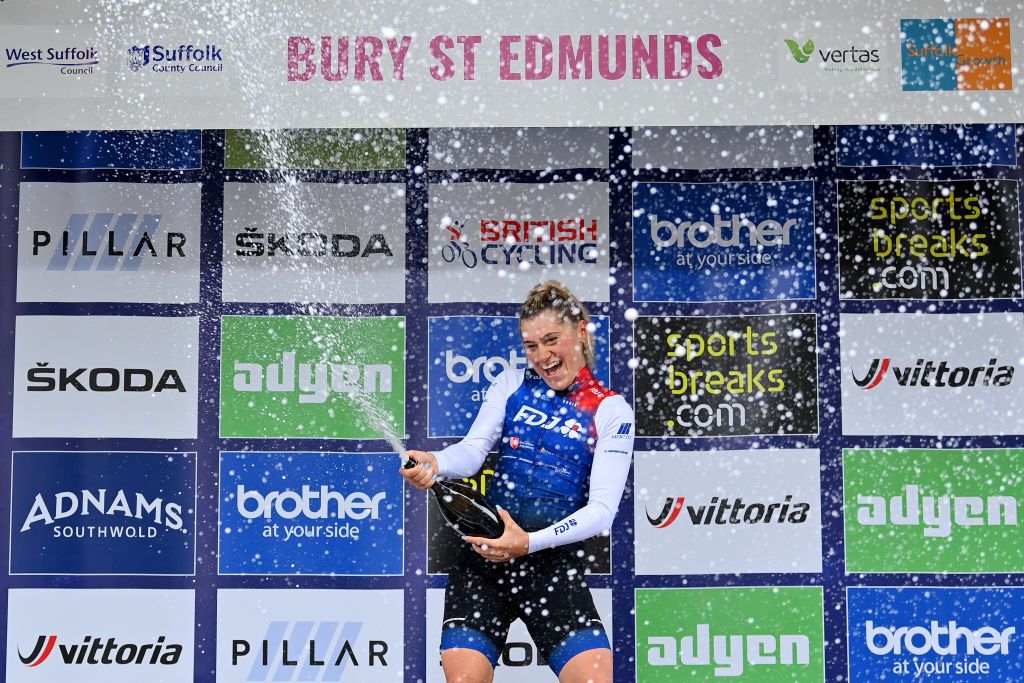 BURY ST EDMUNDS ENGLAND JUNE 06 Clara Copponi of France and Team FDJ Nouvelle Aquitaine Futuroscope celebrates winning the stage on the podium ceremony after the 8th The Womens Tour 2022 Stage 1 from Colchester to Bury St Edmunds WomensTour UCIWWT on June 06 2022 in Bury St Edmunds England Photo by Justin SetterfieldGetty Images