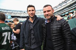 Actors Pablo Schreiber and Liev Schrieber attend the Pittsburgh Steelers vs New York Jets game at MetLife Stadium on November 9, 2014 in East Rutherford, New Jersey