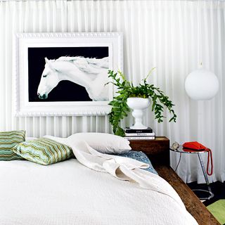 bedroom with white wall wall bed and white frame