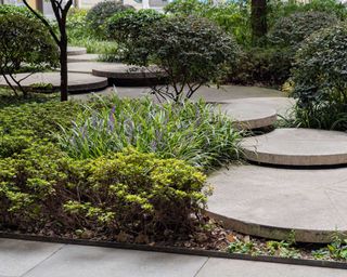 round concrete steps in garden