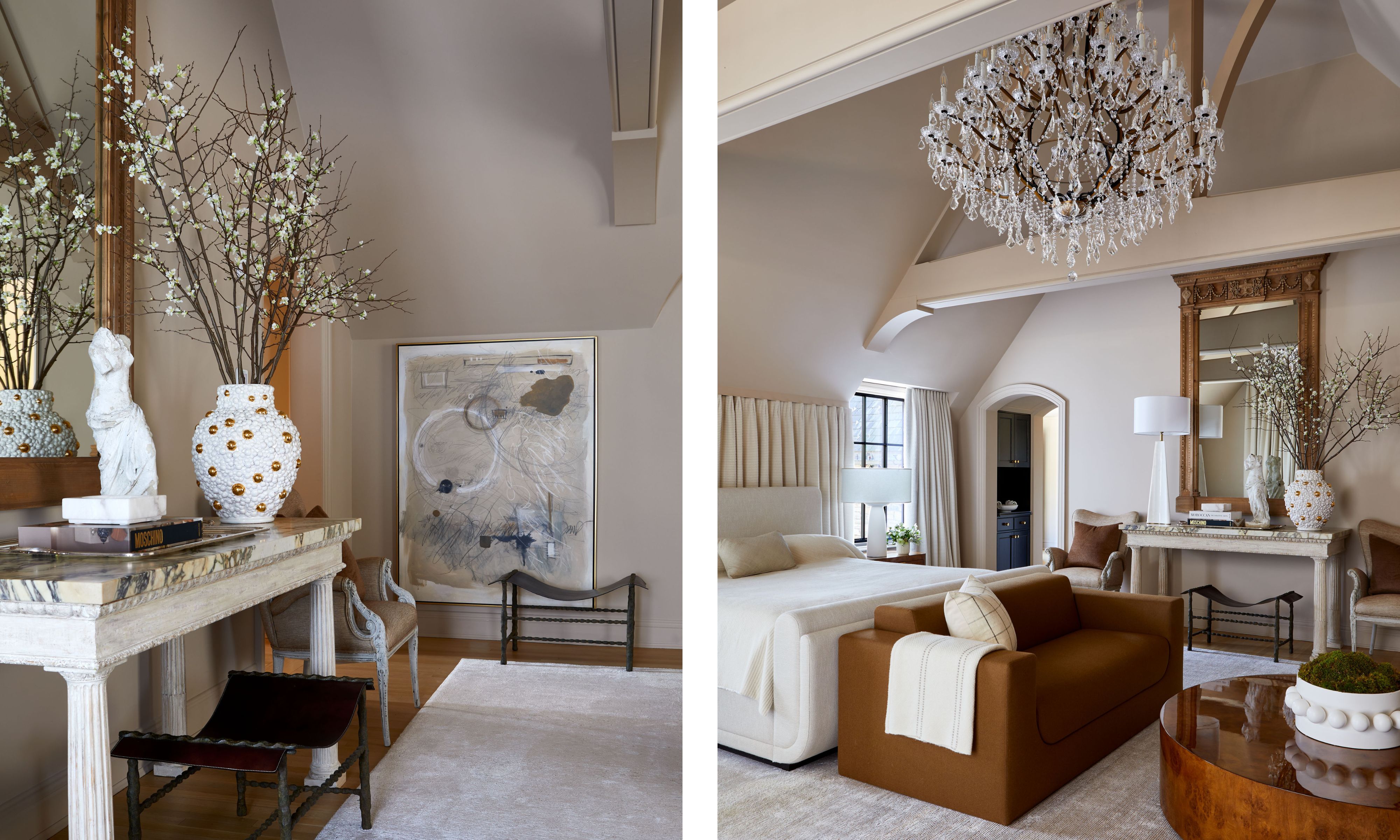 Two images of a large bedroom with a vaulted ceiling. Soft neutral walls, an icy light gray rug, a cream fabric wall behind the large bed, and a brown sofa at the end. A large chandelier and a marble console table.