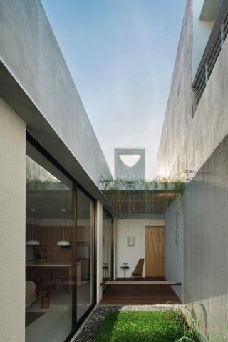 courtyard inside of sculptural jakarta house by Isso Architects