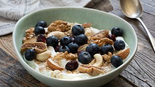 Yogurt bowl with nuts and berries