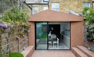 Pink concrete house extensions in London