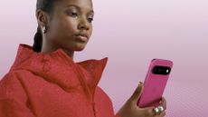 Google Pixel 11 held by woman