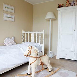 girl bedroom with rocking horse chair