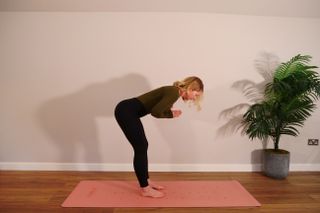 Pre and postnatal exercise expert Hollie Grant demonstrating bend and extend