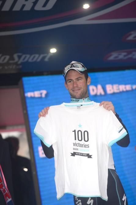 Mark Cavendish (Omega Pharma-QuickStep) commemorates his 100th career victory on the podium in Treviso