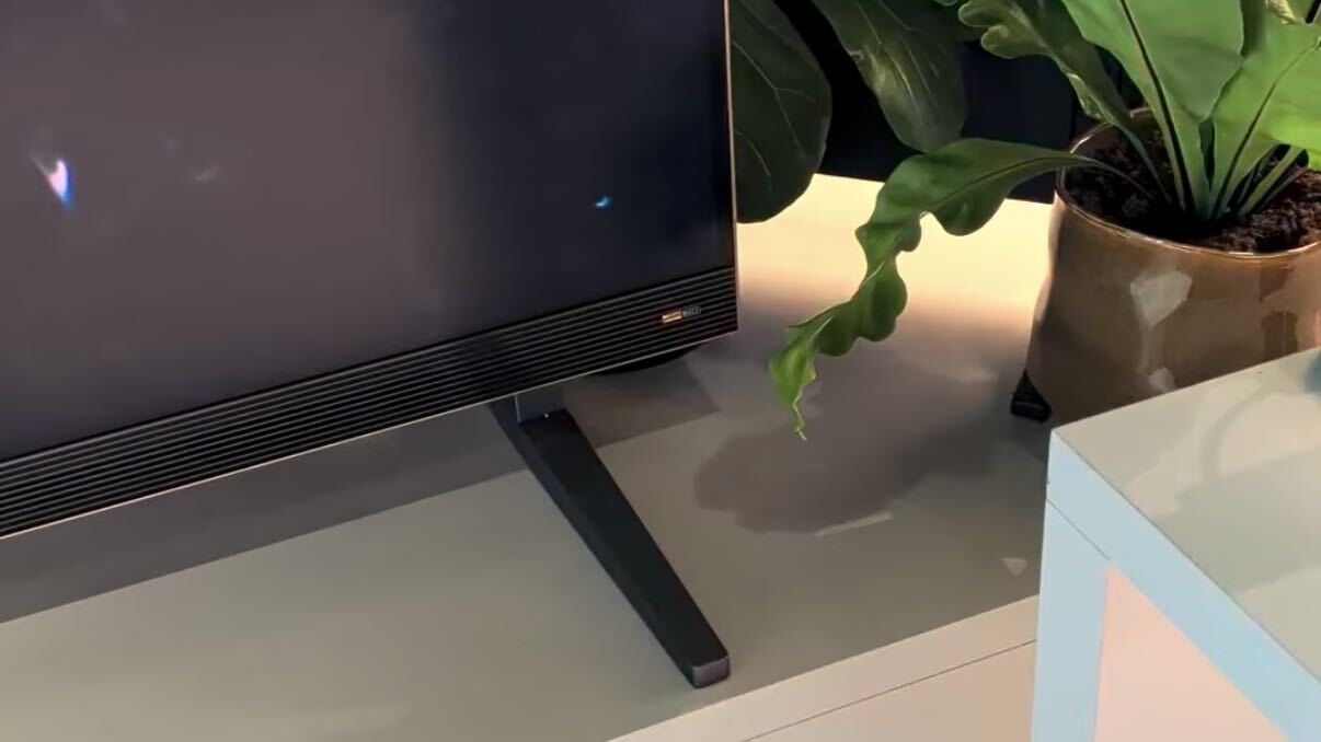 A Haier TV on a stand at IFA