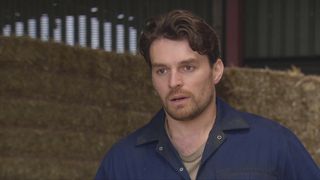 Mackenzie Boyd looks shocked in the barn.