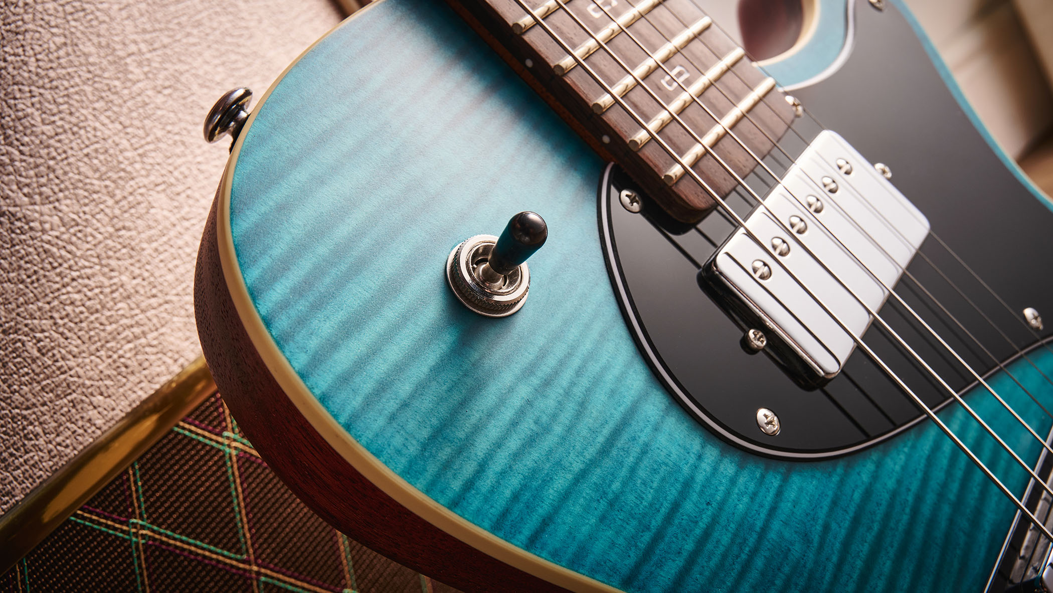 PJD Origin Series Carey Pro: the boutique singlecut is finished in Sea Blue with a black pickguard.