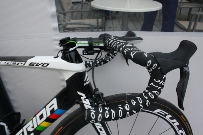 A customised world champion Prologo saddle sits atop the S-flex stem which houses the new generation Shimano Di2 battery