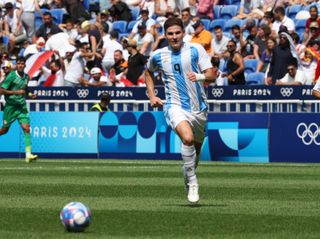 Julian Alvarez of Team Argentina in action during the Men's group B match between Argentina and Iraq during the Olympic Games Paris 2024 at Stade de Lyon on July 27, 2024 in Lyon, France. (Photo by Claudio Villa/Getty Images) Olympics