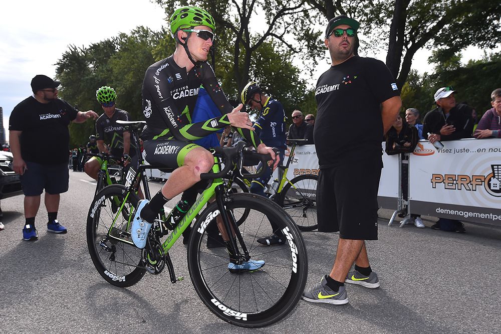 Zak Dempster chats with Cycling Academy staff before the start in Montreal