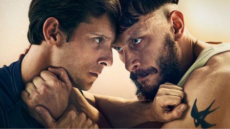 Jamie Bell and Richard Gadd hold each other in an awkward grip