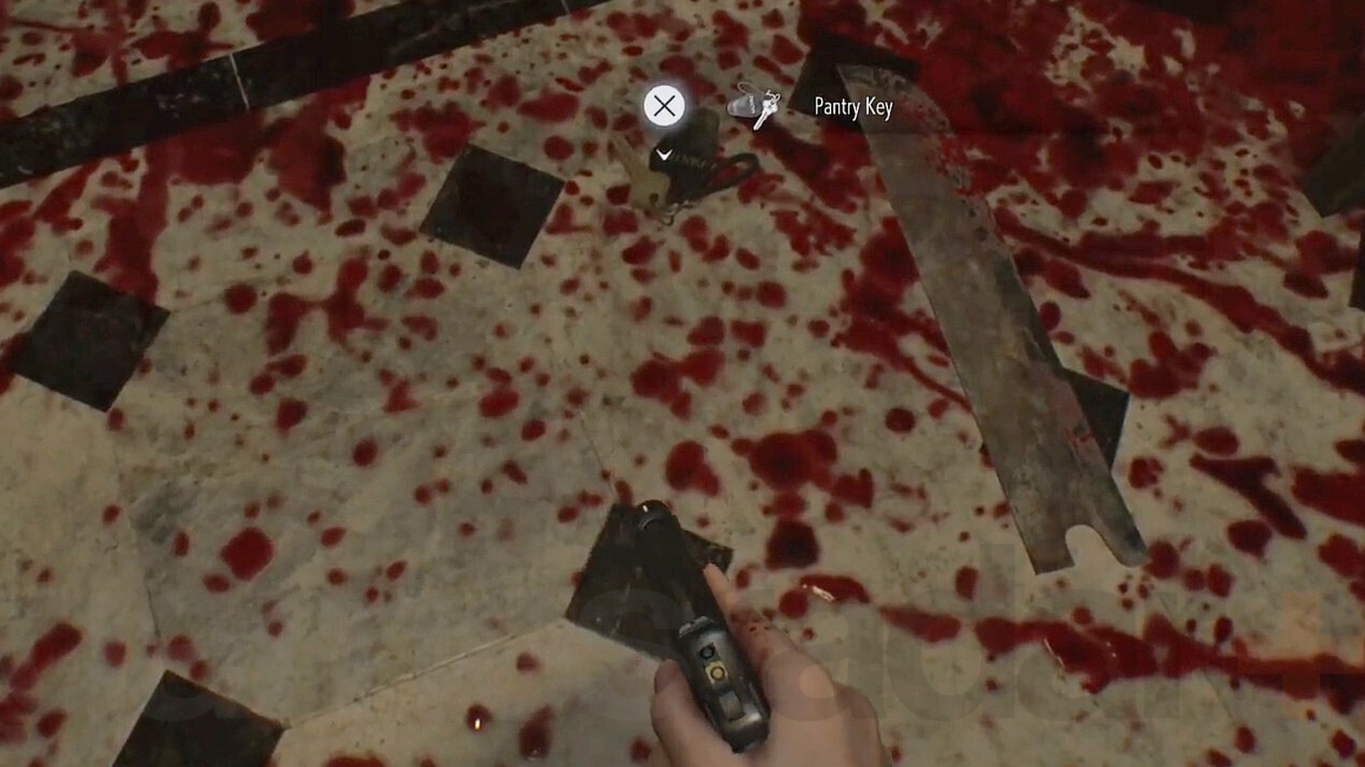 The Resident Evil Requiem pantry key sits on the floor in a pool of blood.