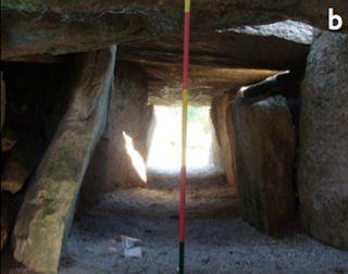 View of the Dolmen da Orca passage and entrance while standing within the tomb's chamber, looking toward the "window of visibility."