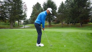 PGA pro Barney Puttick demonstrating how to set up properly when hitting a chip shot