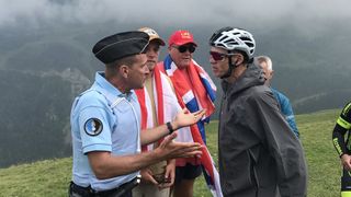 Chris Froome vents his anger at the French gendarme who dragged him off the road