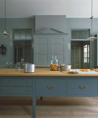 blue kitchen with green blue walls