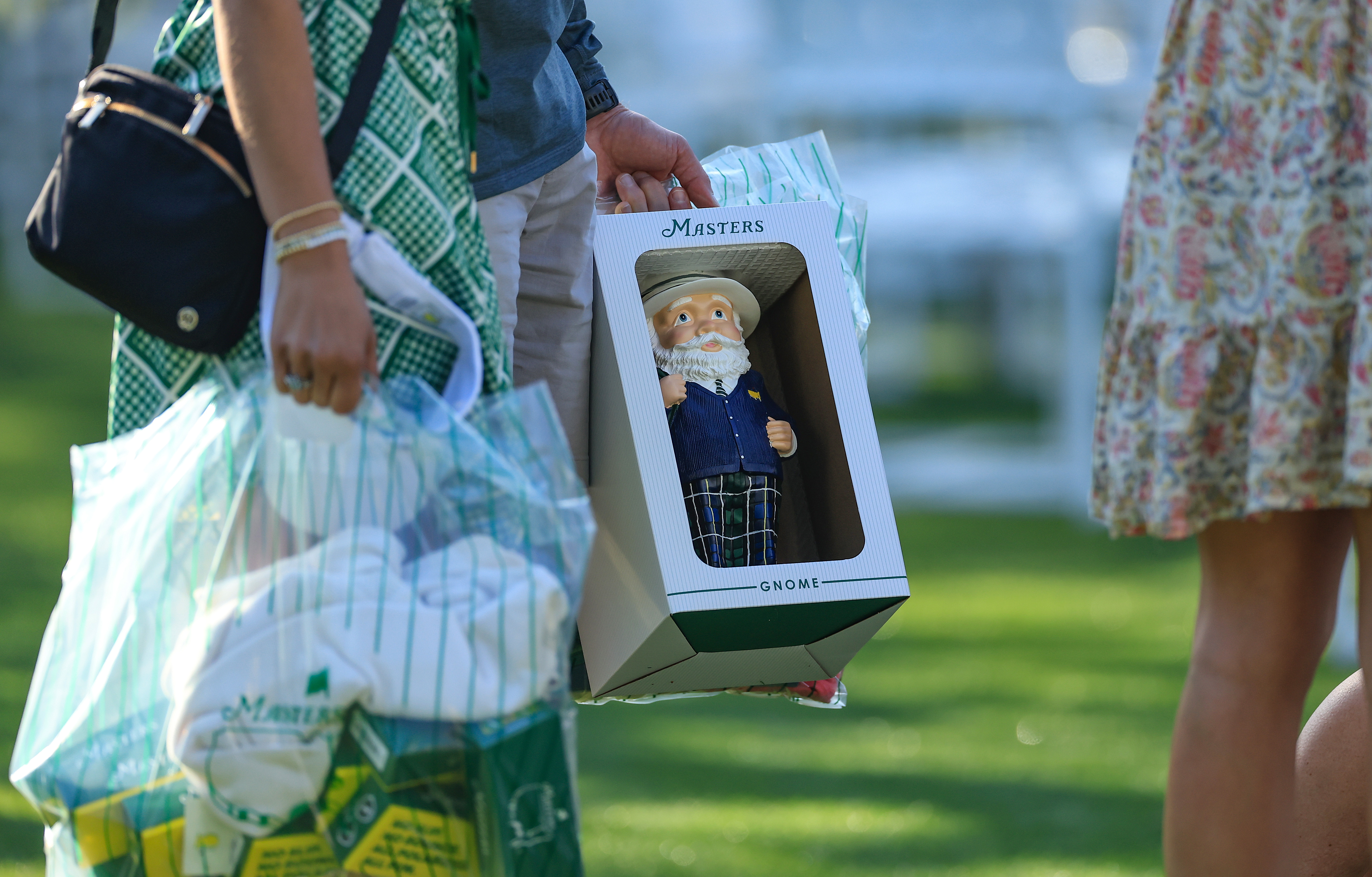 A detailed photograph of a patron's shopping including the popular Gnome during a practice round prior to the 2024 Masters Tournament at Augusta National Golf Club