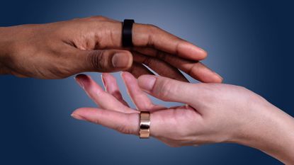 Two hands wearing Ultrahuman Ring Airs against blue background