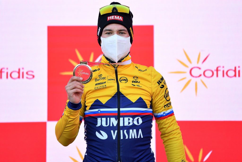 MIRADOR DE ZARO DUMBRA SPAIN NOVEMBER 03 Podium Primoz Roglic of Slovenia and Team Jumbo Visma Celebration Trophy during the 75th Tour of Spain 2020 Stage 13 a 337km Individual Time Trial stage from Muros to Mirador de zaro Dumbra 278m ITT lavuelta LaVuelta20 La Vuelta on November 03 2020 in Mirador de zaro Dumbra Spain Photo by Justin SetterfieldGetty Images
