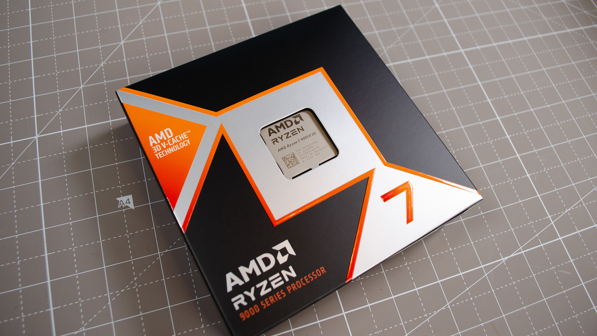 An AMD Ryzen 7 9800X3D in its retail packaging