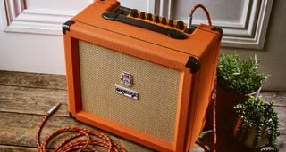 Orange O Tone 40: the new solid-state combo from the iconic British amp brand has the classic orange vinyl, wheat-coloured basketweave grille clothe and orange and white control panel with black dials.