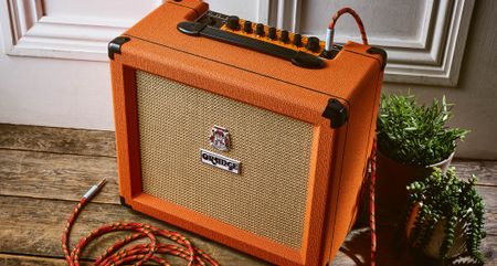 Orange O Tone 40: the new solid-state combo from the iconic British amp brand has the classic orange vinyl, wheat-coloured basketweave grille clothe and orange and white control panel with black dials.