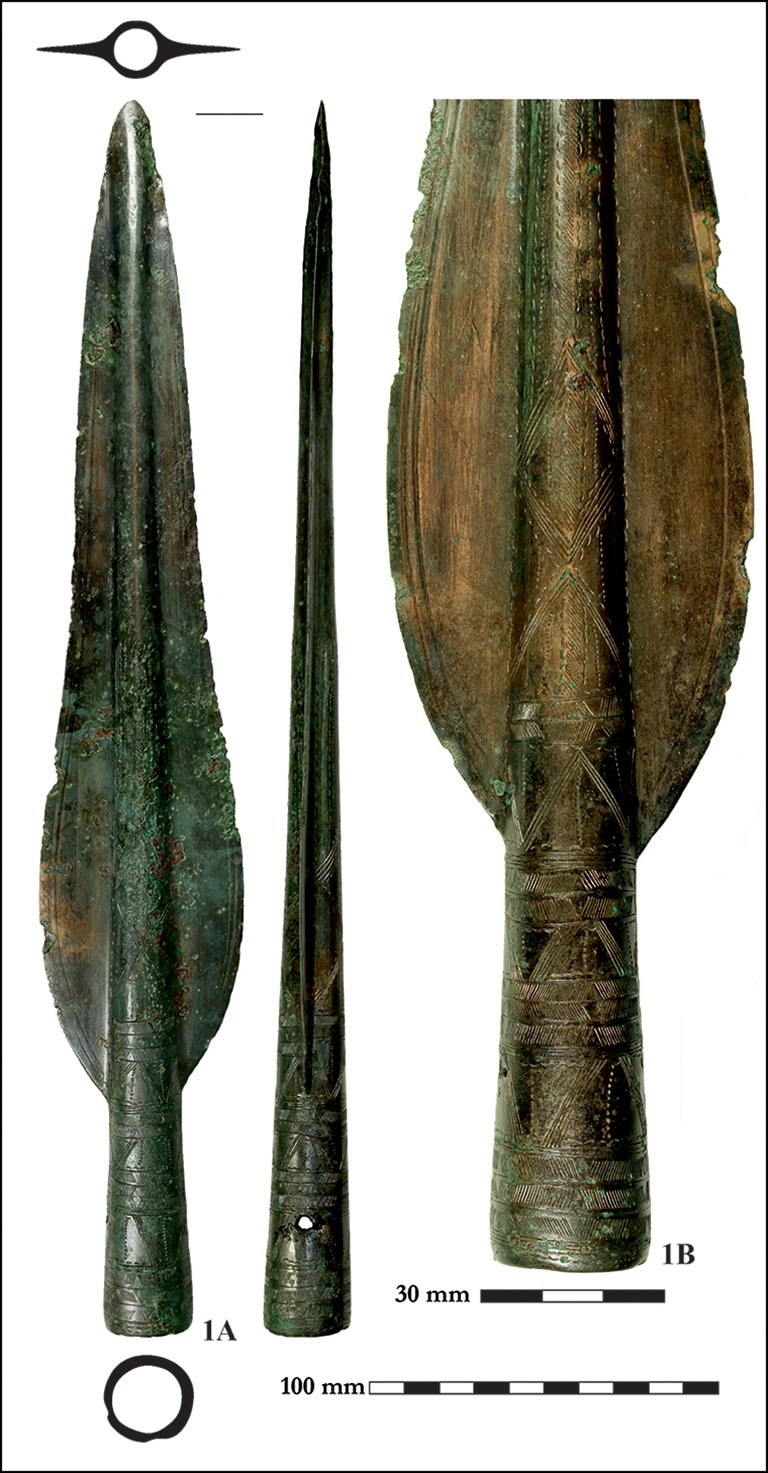 a close-up of a metal spearhead