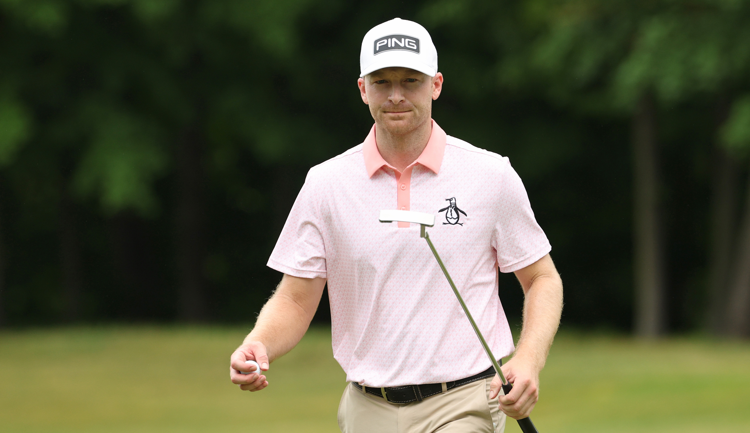 Brian Campbell walks off the green