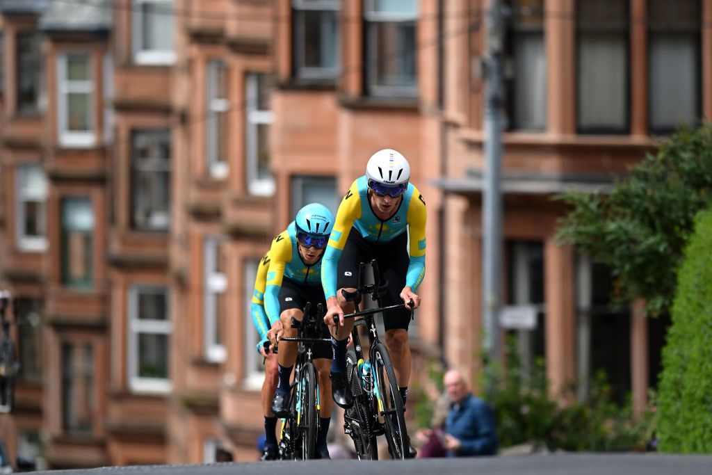 GLASGOW SCOTLAND AUGUST 08 Maksym Bilyi Vitalii Novakovskyi Dmytro Polupan and Team Ukraine sprint during the Team Time Trial Mixed Relay a 403km race from Glasgow to Glasgow at the 96th UCI Cycling World Championships Glasgow 2023 Day 6 UCIWT on August 08 2023 in Glasgow Scotland Photo by Dario BelingheriGetty Images