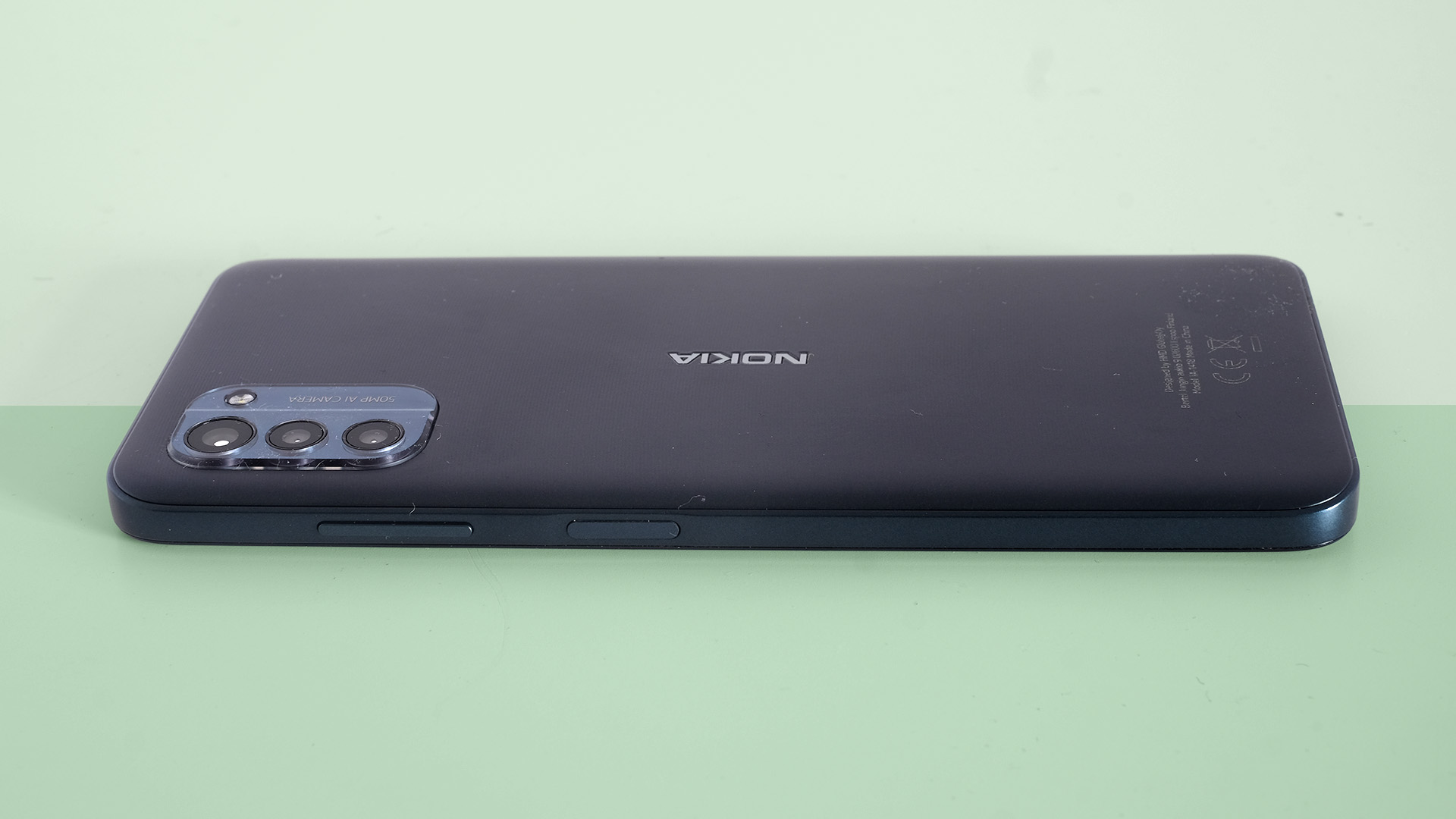 A Nokia G21 on its back, viewed side on