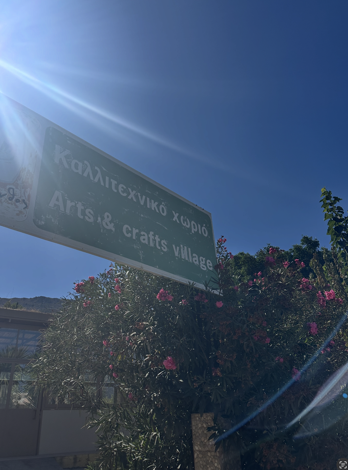 sign reading "Arts and Crafts Village"