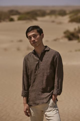 Man in Luca Faloni linen shirt in desert