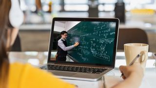 Best online physics courses - Student learning physics on the computer. Tzido via Getty Images