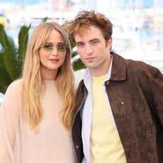 Jennifer Lawrence and Robert Pattinson attend the photocall for 'Die My Love' at Cannes Film Festival