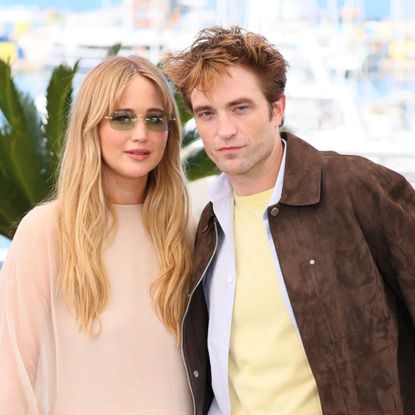 Jennifer Lawrence and Robert Pattinson attend the photocall for 'Die My Love' at Cannes Film Festival 