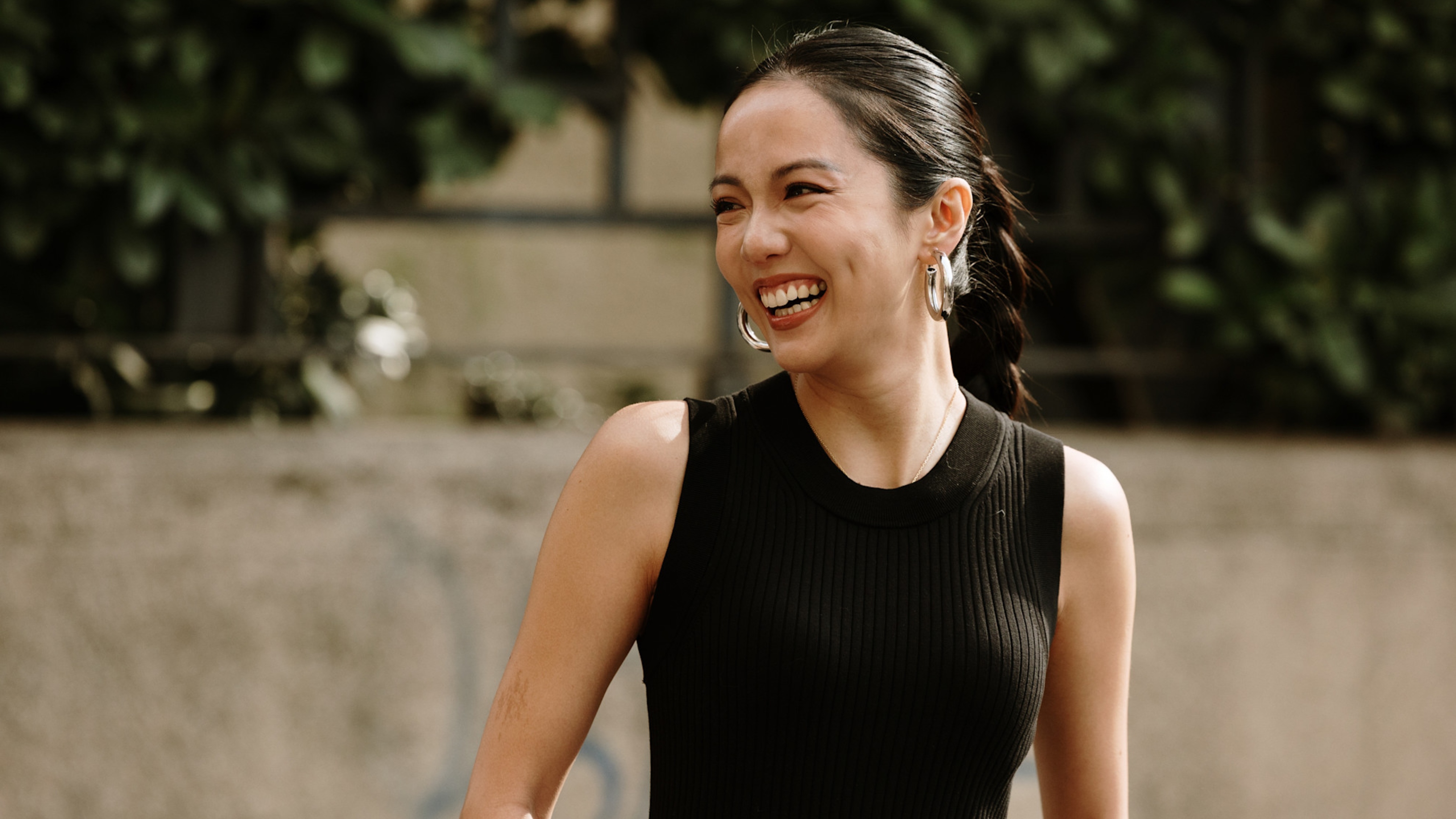 woman wearing a black tank top