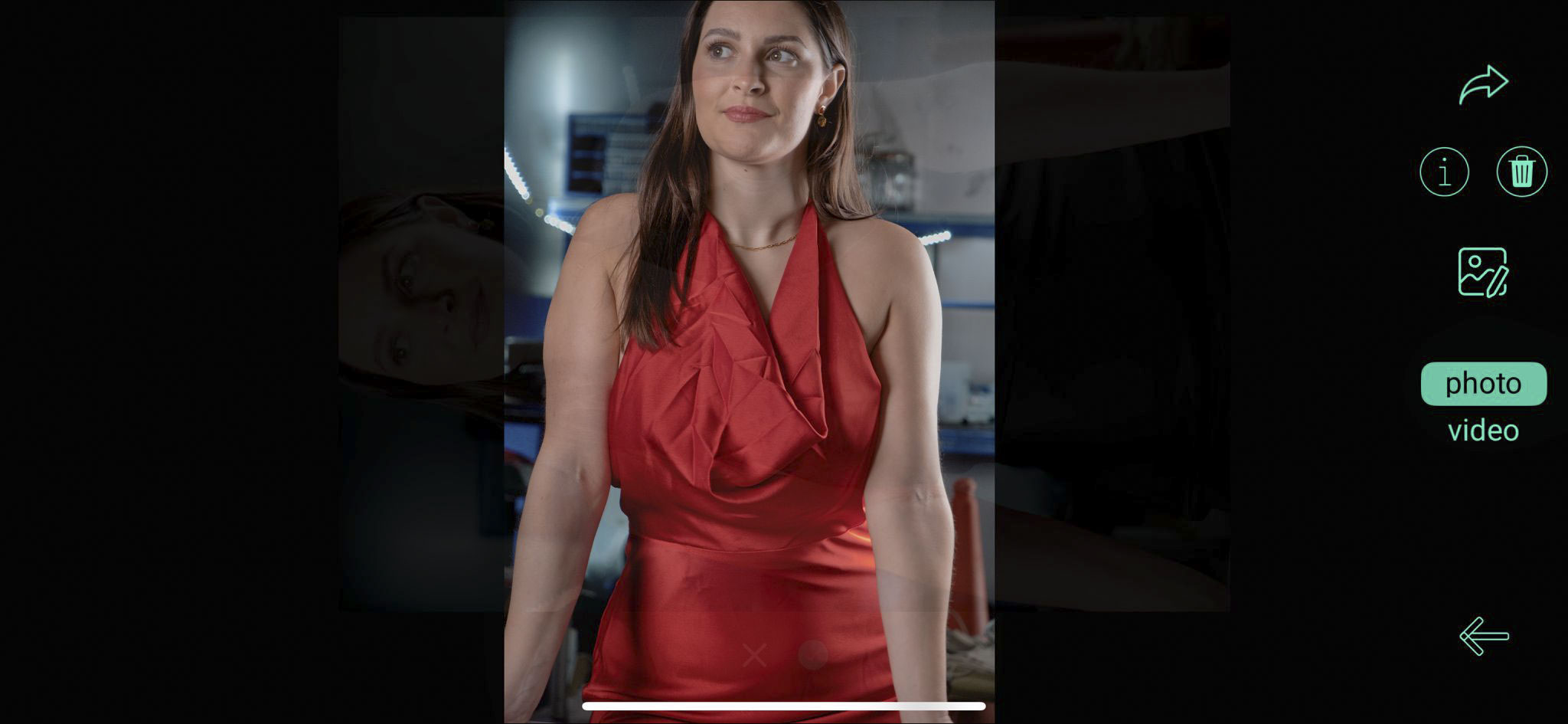 Caira camera user interface with a photo of a lady in a red dress