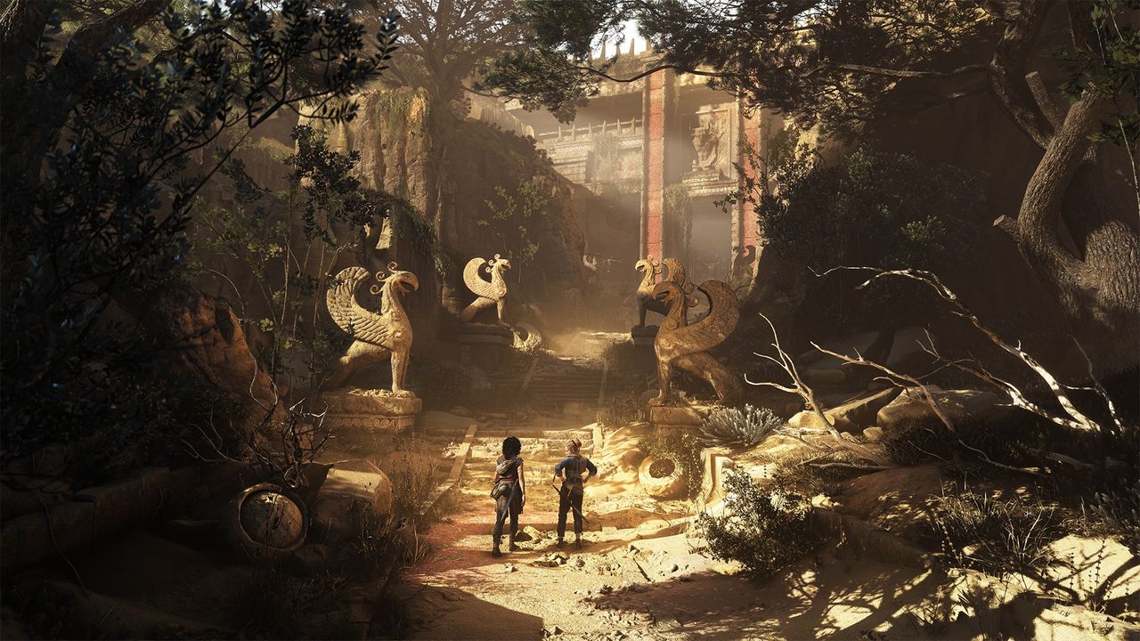 Sophia and Leni stand amid sunny temple ruins in Resonance: A Plague Tale Legacy