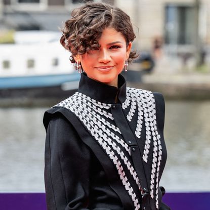 Zendaya attended the Amsterdam premiere of 'Spider-Man: Brand New Day' in a Louis Vuitton tailcoat and a strawberry red skirt
