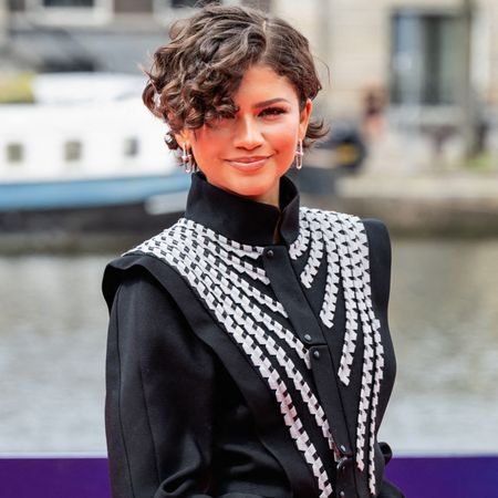 Zendaya attended the Amsterdam premiere of 'Spider-Man: Brand New Day' in a Louis Vuitton tailcoat and a strawberry red skirt