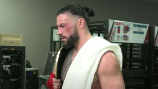 Roman Reigns ignores reporter after Seth Rollins Royal Rumble fight 2022.