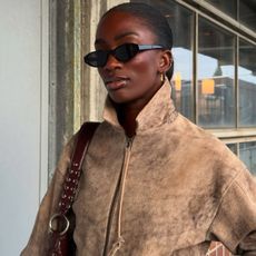 Liv Madeline wearing an H&M brown jacket