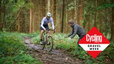 Andy riding down a trail with a coach cheering on