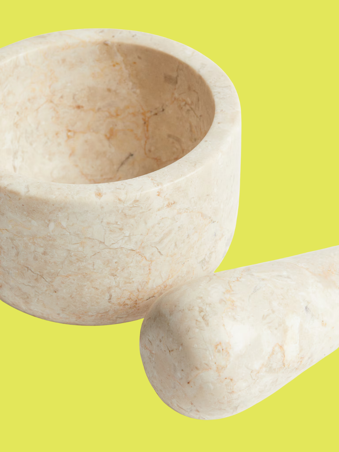 A beige mortar and pestle set from H&amp;amp;M