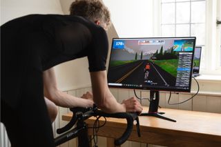 Image shows riders using tech to aid their training.